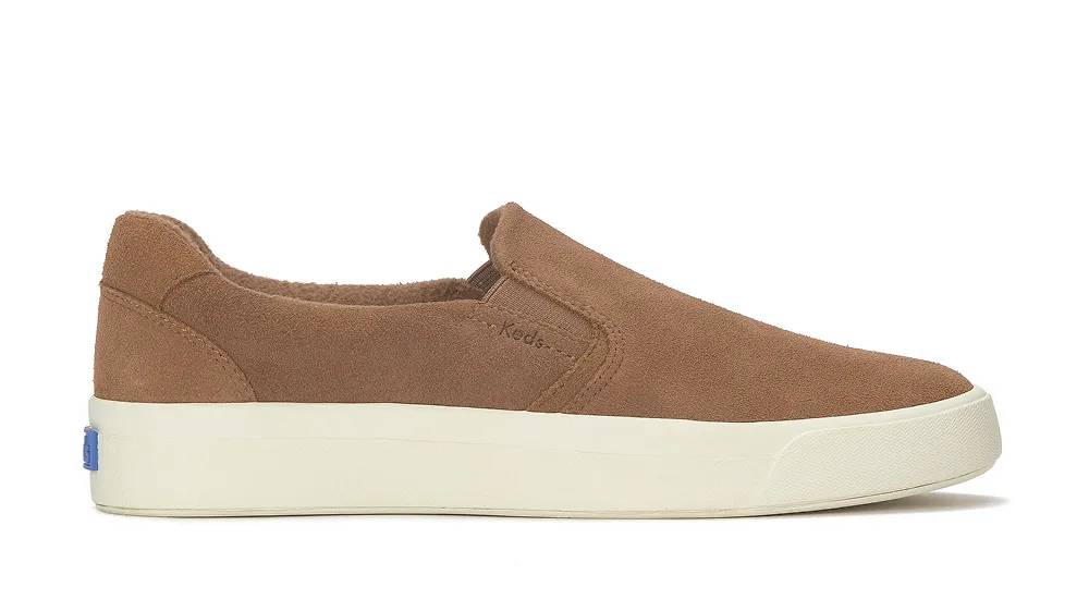 A side view of the Pursuit Suede Slip-On in cognac.