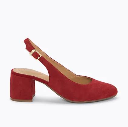 A side view of a red women's movena pump in red.