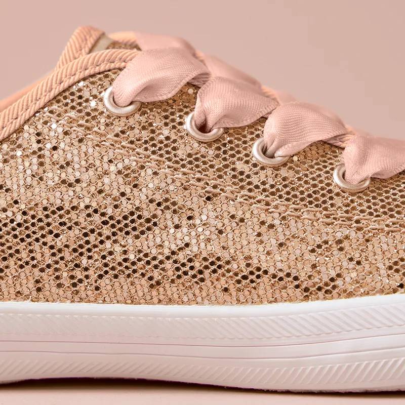 A close-up of the Big Kids’ Kickstart Celebrations in rose gold glitter.