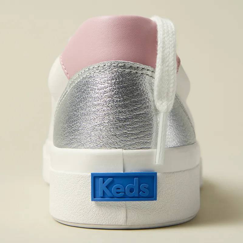 A close-up of the heel of the Pursuit Leather Metallic Pop Lace-Up.