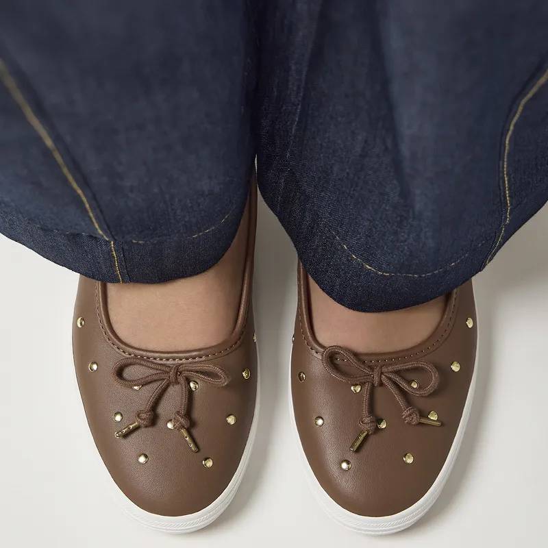 A top-down view of the Maisie Ballet Leather Studs in brown shown on foot paired with dark-wash denim. Text under the image says Sneakerinas. Ballet style, sneaker feel. Shop Now.