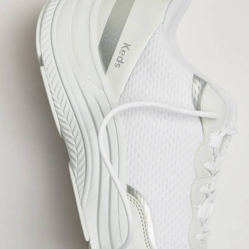 A close-up view of the podiatrist-approved BlissMove Mesh/Leather Lace-Up in white/silver showcasing the comfort sneaker’s sculpted midsole and breathable mesh material.  Podiatrist Approved. Proven to promote foot health benefits. Shop Now.