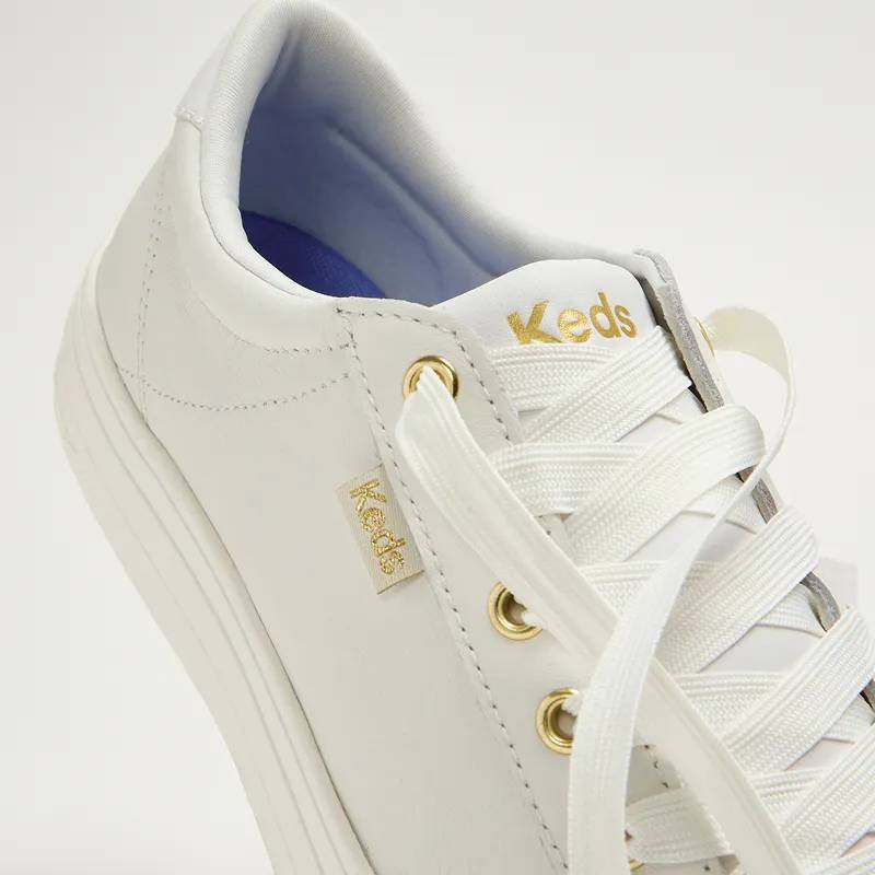 A close-up view of the plush heel cushioning on the Park Leather Lace-Up in white. Enhanced Cushioning. Padding in high-pressure zones reduces friction. Shop Now.