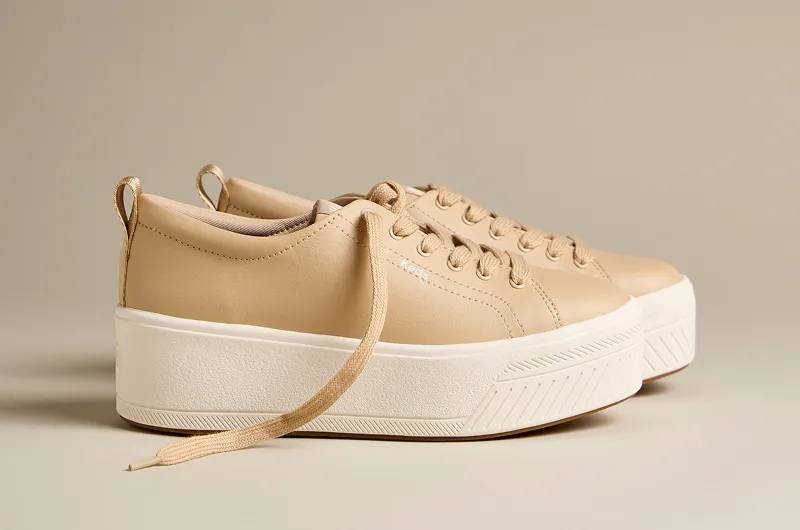 A side view of the Skyler Leather Lace-Up in Cuban sand. Shop Platforms.