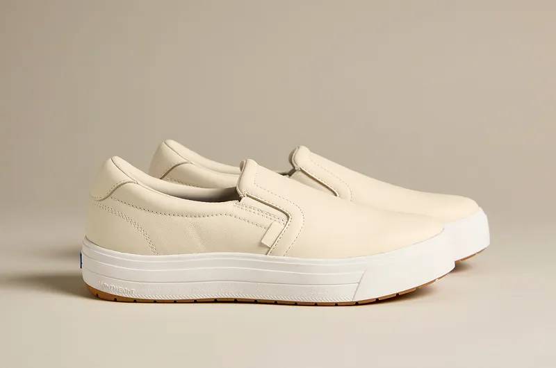 A side view of the Park Leather Slip-On in parchment.