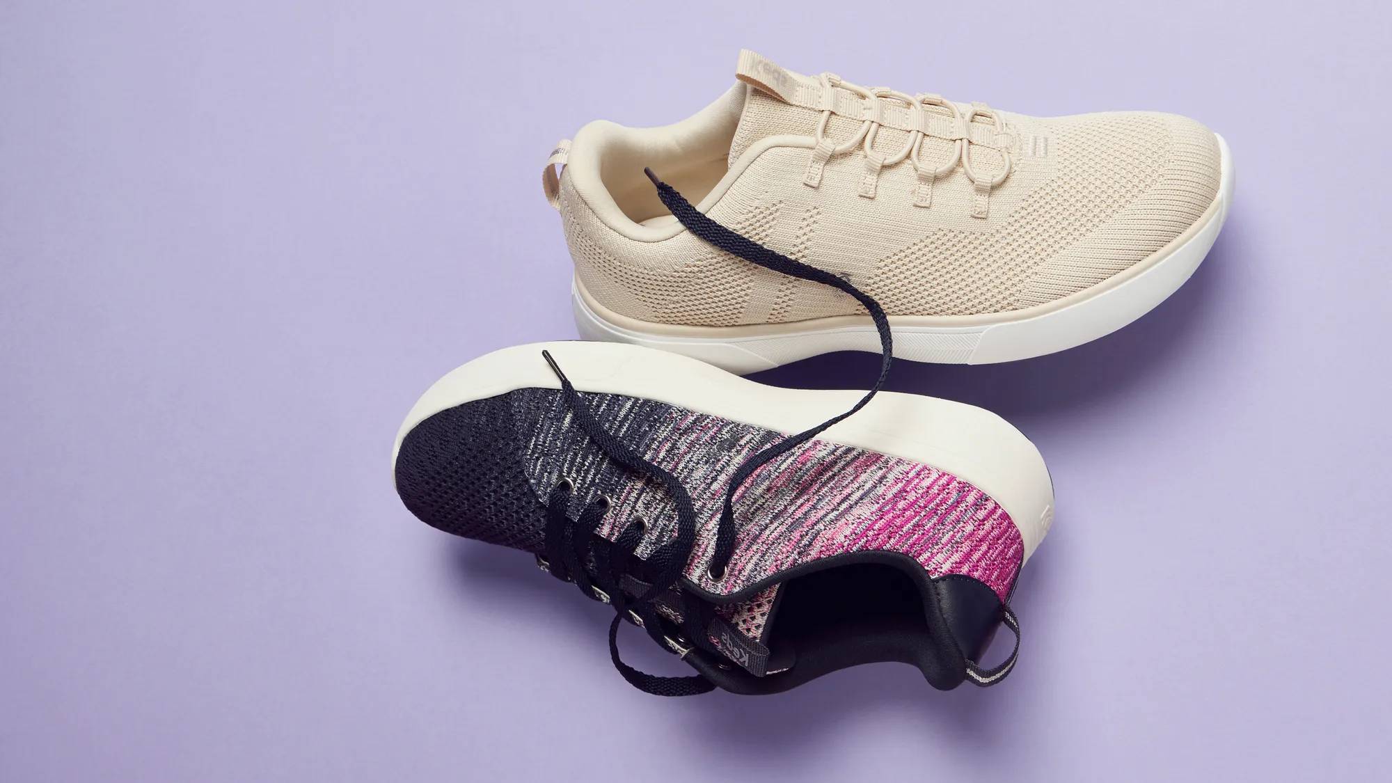 A lavender background that highlights the BlissWalk Ombre Knit Lace-Up in navy.  Spring In Your Step Sale. $30 Sneakers. Use code: SNEAKS Select styles only. See details. Shop Now