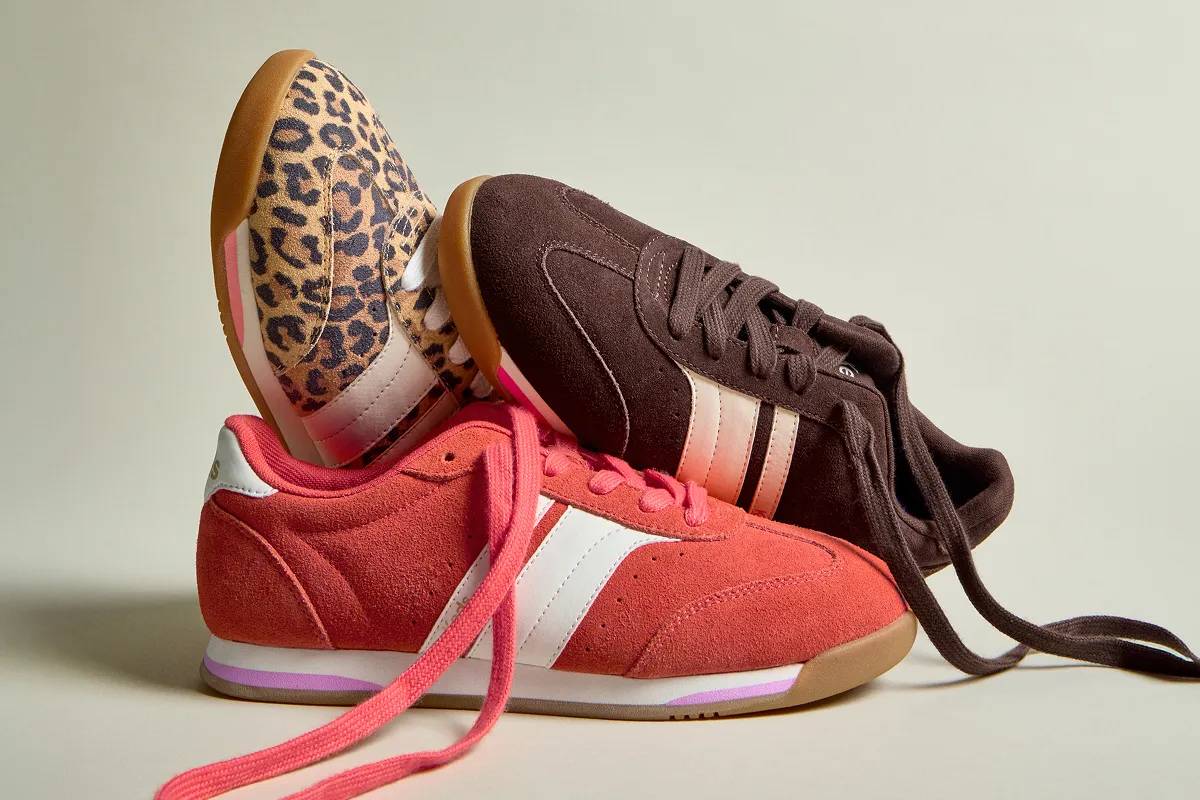 A close-up on three different colorways of the Revival Suede/Leather Lace-up: tan/brown leopard print, chocolate brown/egret, and orange/Snow White.