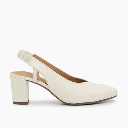 a side view of a white litney pump