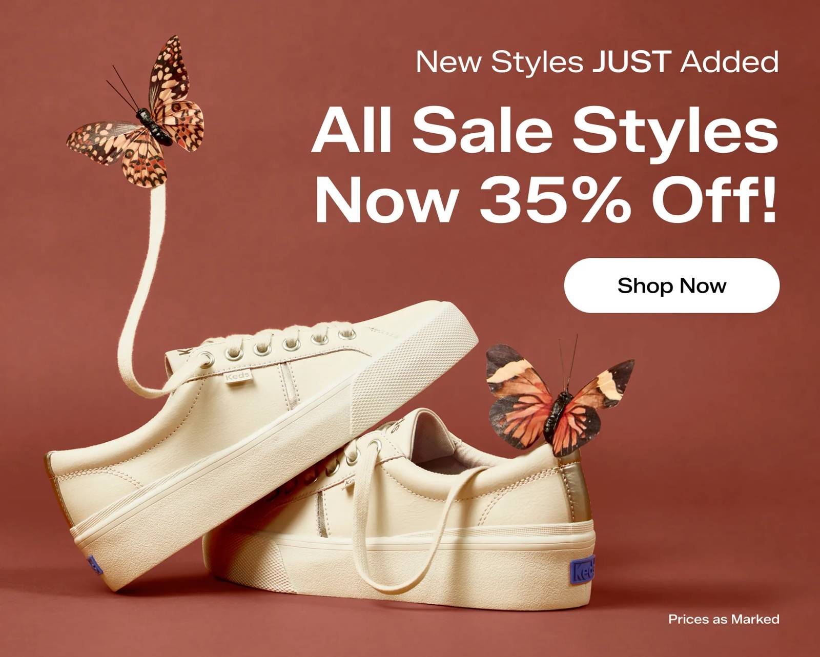 A pair of Jump Kick Duo Leather Lace-Ups in parchment shown against a warm brown background. A butterfly is shown holding up one of the sneaker’s shoelaces, another butterfly sits atop the other sneaker's heel. Text above the sneakers saysNew Styles Just Added. All Sale Styles Now 35% Off! Shop Now. Prices as marked.