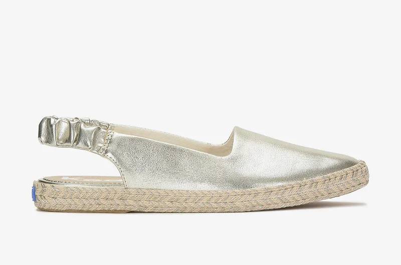 A side view of the Point Slingback Metallic Leather Jute Foxing in light gold.