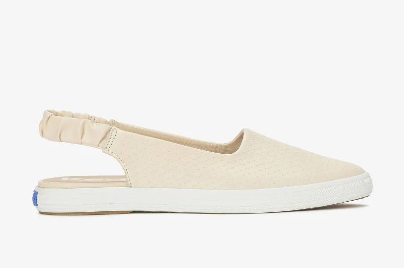 A side view of the Point Slingback Basketweave Emboss Leather in parchment.