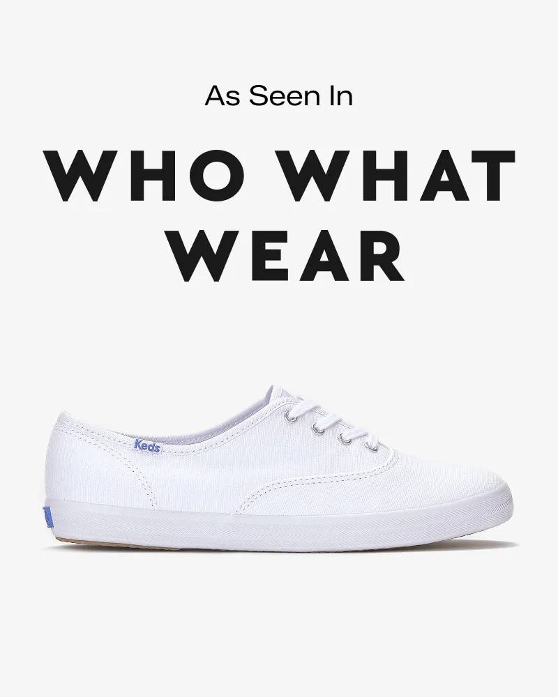 Text that says As Seen In sits above the WHO WHAT WEAR logo. Below is a product image of the Keds Champion Canvas Lace-Up sneaker in white. Text below reads Original Keds Champion. The must‑have sneaker of the year. Shop Now.