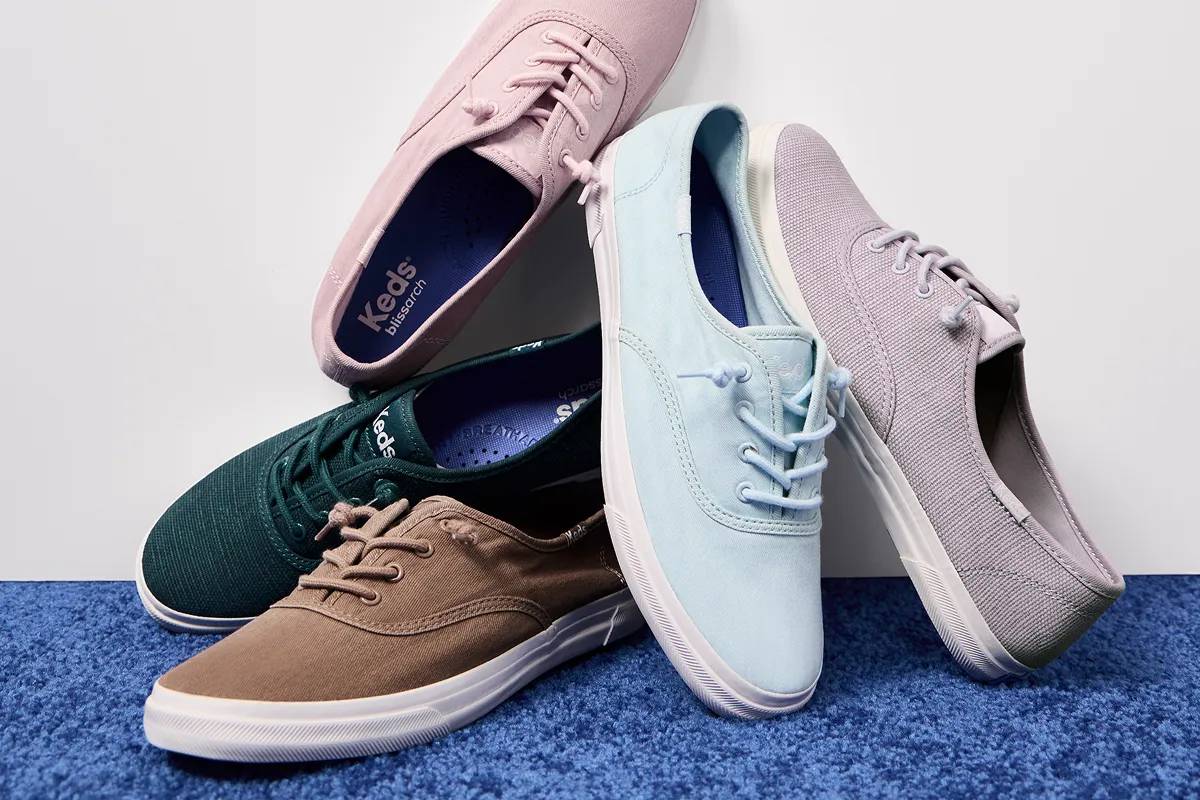 A pile of four new colors of the Rillax Champ Slip-On sneakers. Text below says Only Available Here. Shop exclusives.