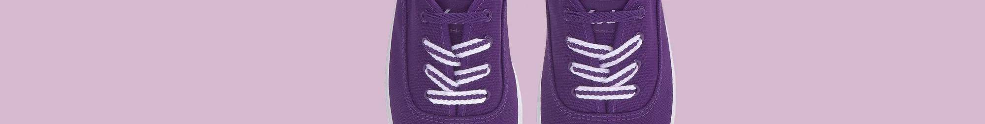 A light purple background with black text that says 35% Off Ends Tonight! To the right of the text is a partial view of a pair of Keds Champion Canvas Lace-Ups in purple shown from above.