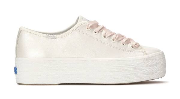A side view of the Triple Up Pearlized Leather Ballet in white.