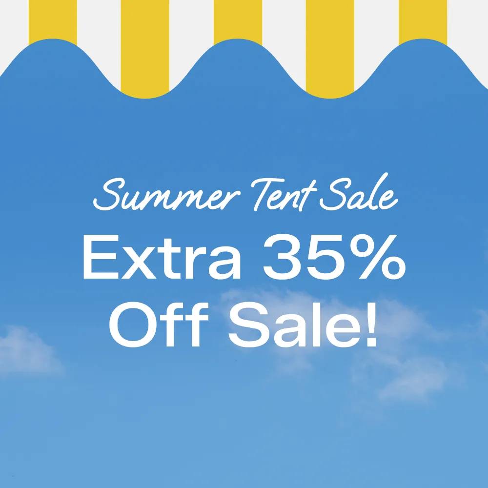 A yellow-and-white striped awning with a blue sky background.