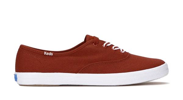 A side view of the Keds Champion Canvas Lace-Up in dark red. Sop Canvas.
