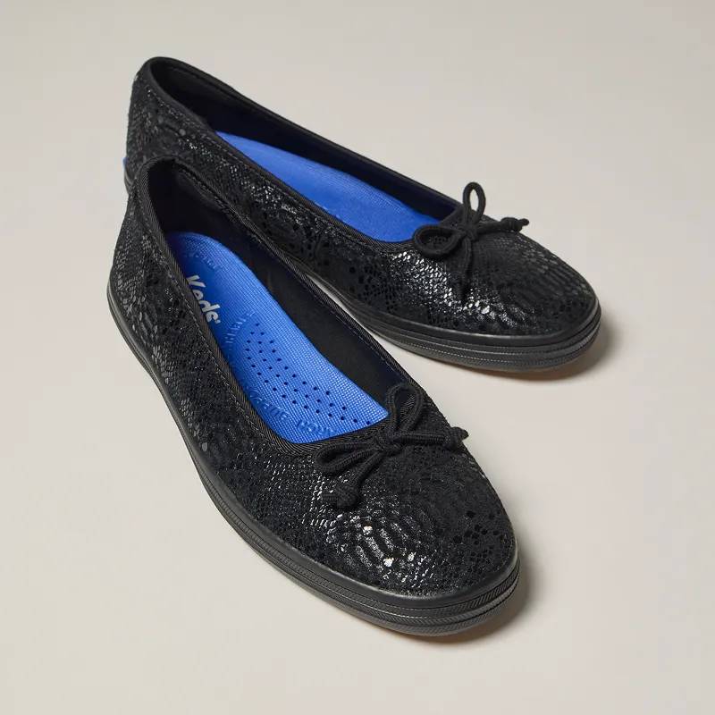 A grey background with an angled view of the Maisie Ballet Metallic Foil Snake Leather in black.