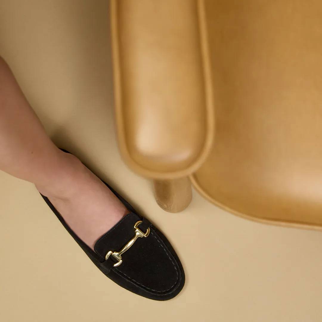 a black olleya mule for any event