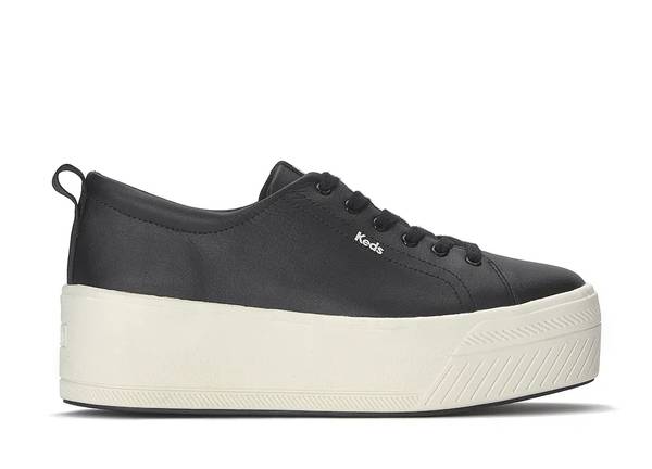 A side view of the Skyler Leather Lace-Up in black.