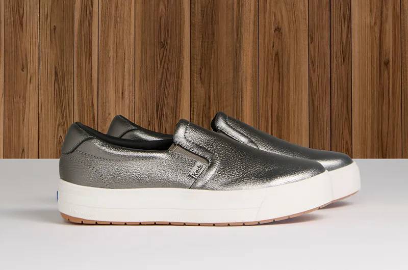 A side view of the Park Metallic Leather Slip-On in gunmetal.