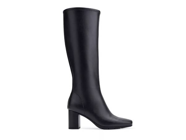 Featuring a black leather tall boot.