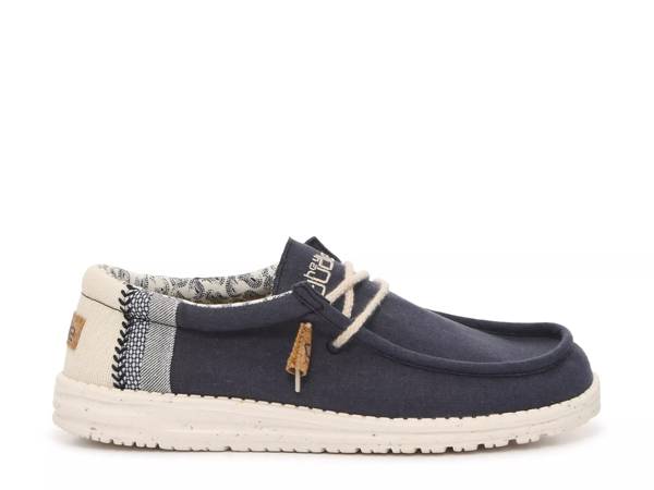 Featuring the men's Hey Dude Wally Linen Slip On. Click to shop men's slip on sneakers at DSW Designer Shoe Warehouse.