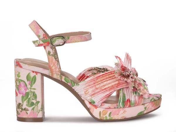Featuring a floral dress sandal.