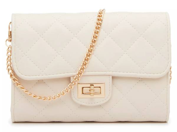 Featuring an off white crossbody purse from Kelly & Katie.