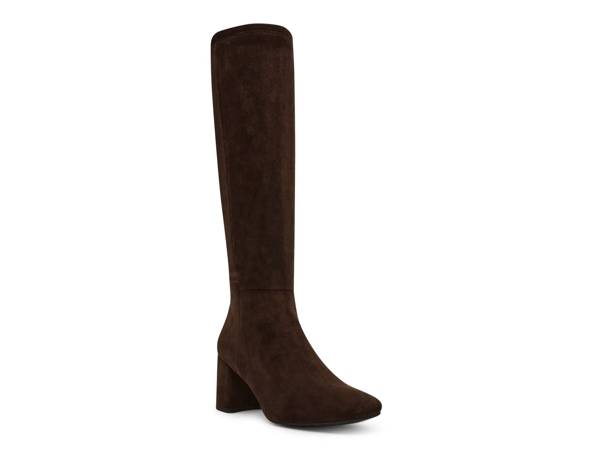 Featuring a brown tall boot.