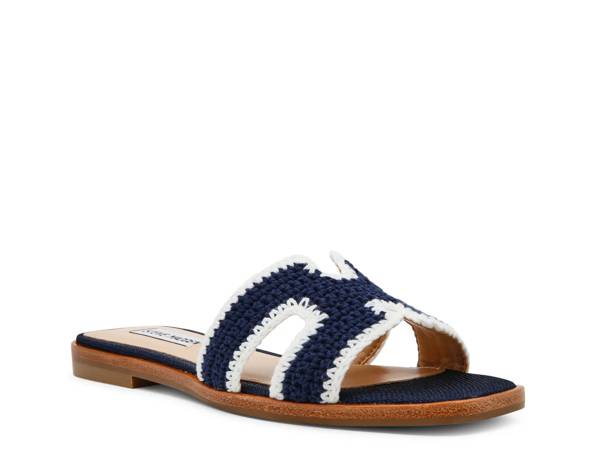 Click to shop flat sandals at DSW Designer Shoe Warehouse.