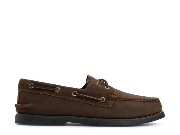 Featuring a pair of brown Sperry boat shoes.