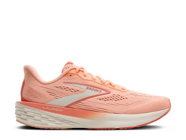 Featuring an orange and coral Brooks running shoe.