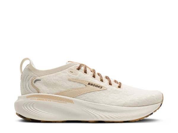 Featuring a white Brooks running shoe.