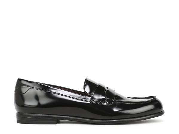 Featuring a black penny loafer from Franco Sarto.