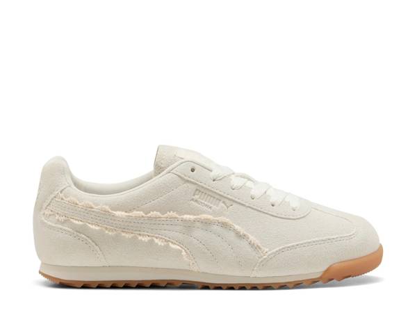 Click to shop women's white sneakers