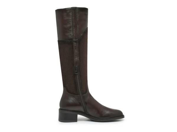 Featuring a pair of dark brown knee high ridiing boots from Coach and Four.
