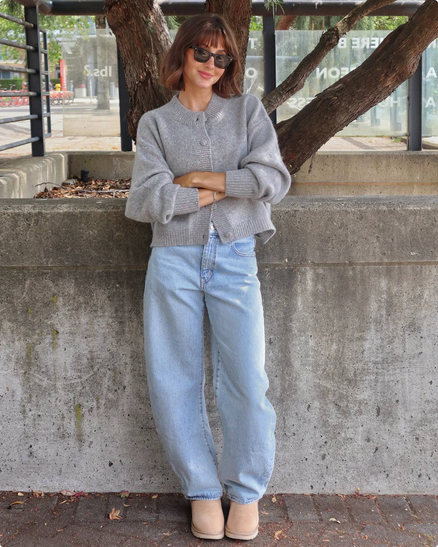 Influencer Amber Scott leaning against a wall
