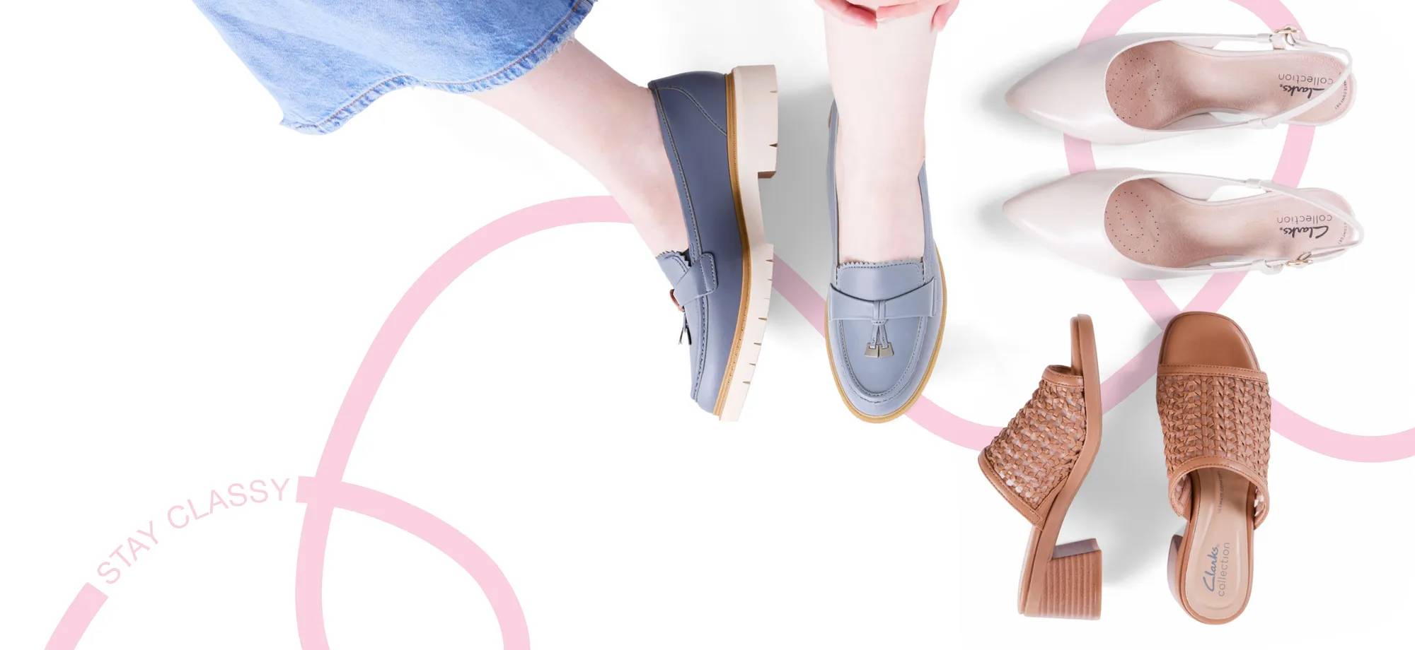 Person wearing blue Clarks loafers with white Clarks heels and tan Clarks heeled sandals next to it