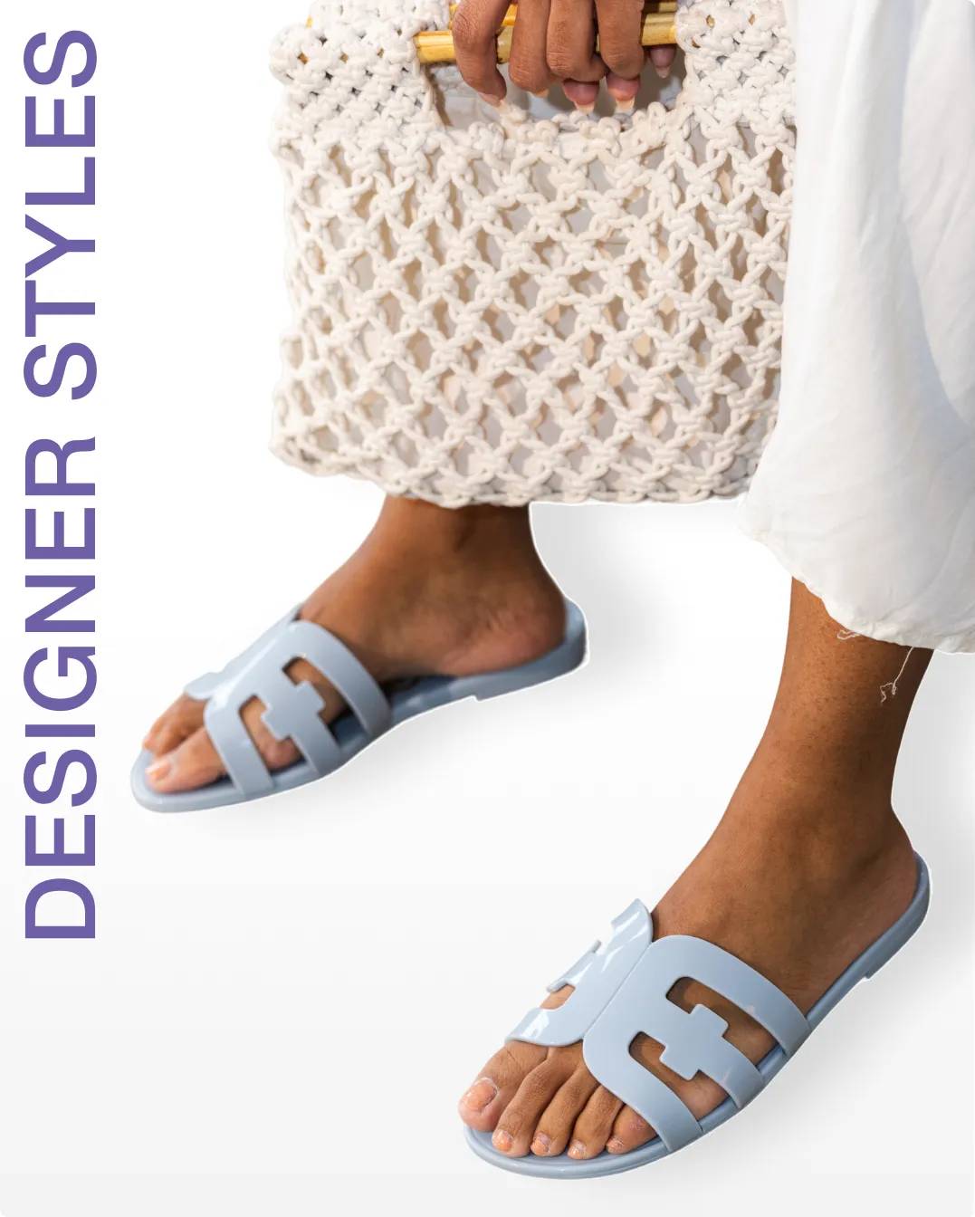 Woman wearing light blue flat sandals