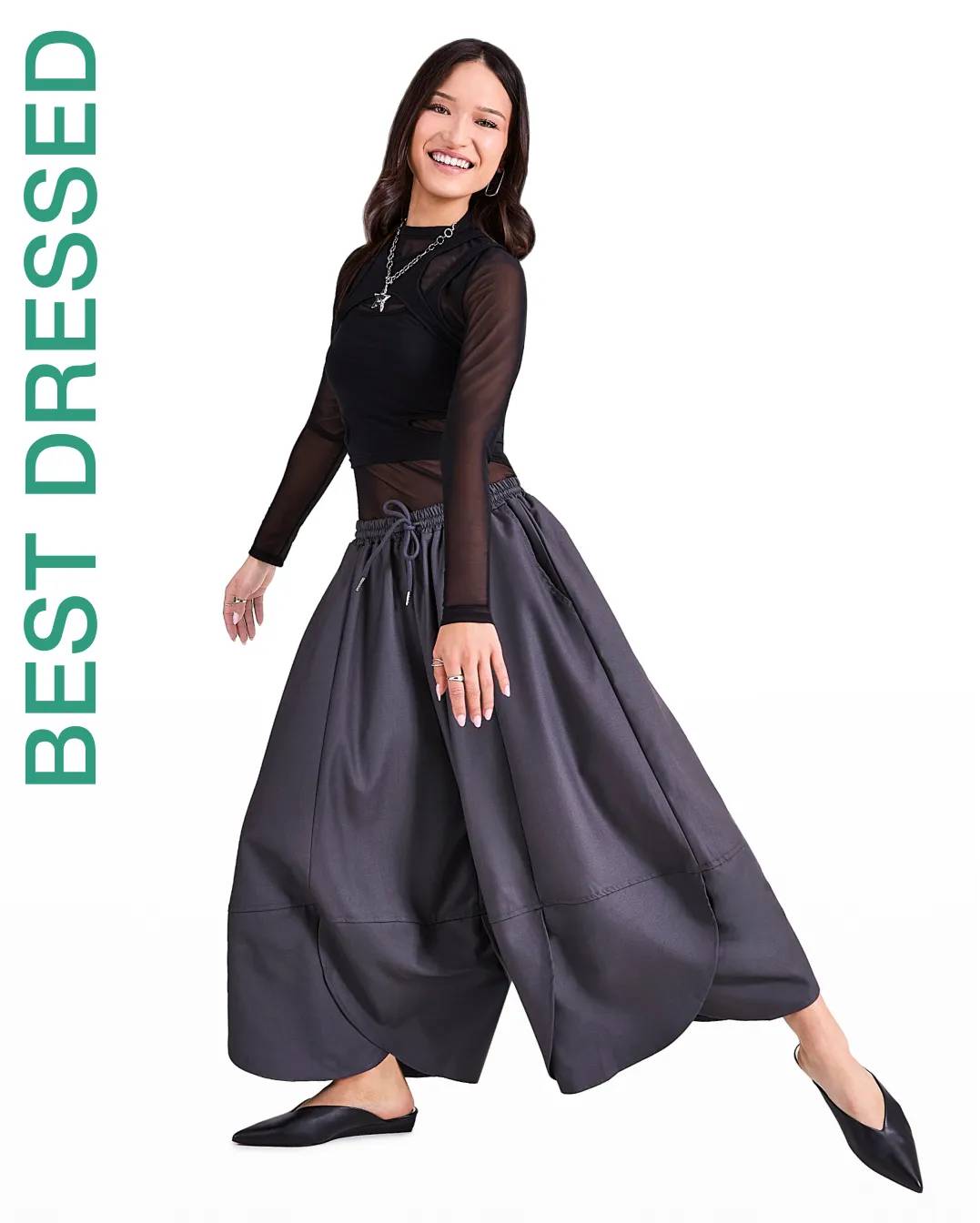 Woman wearing black mules