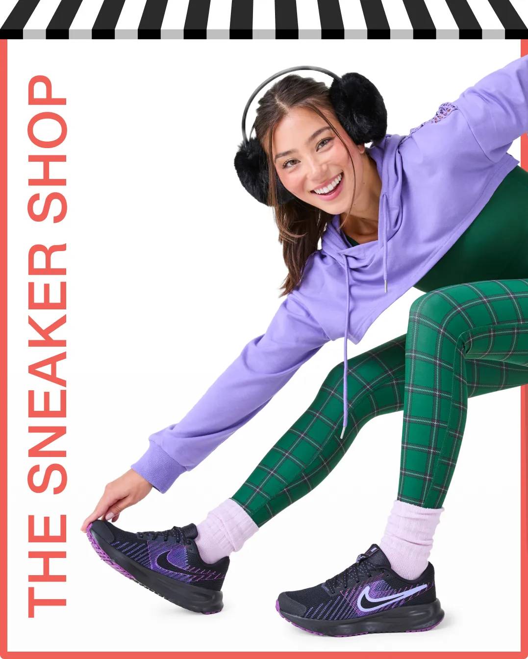Woman wearing black and purple sneakers