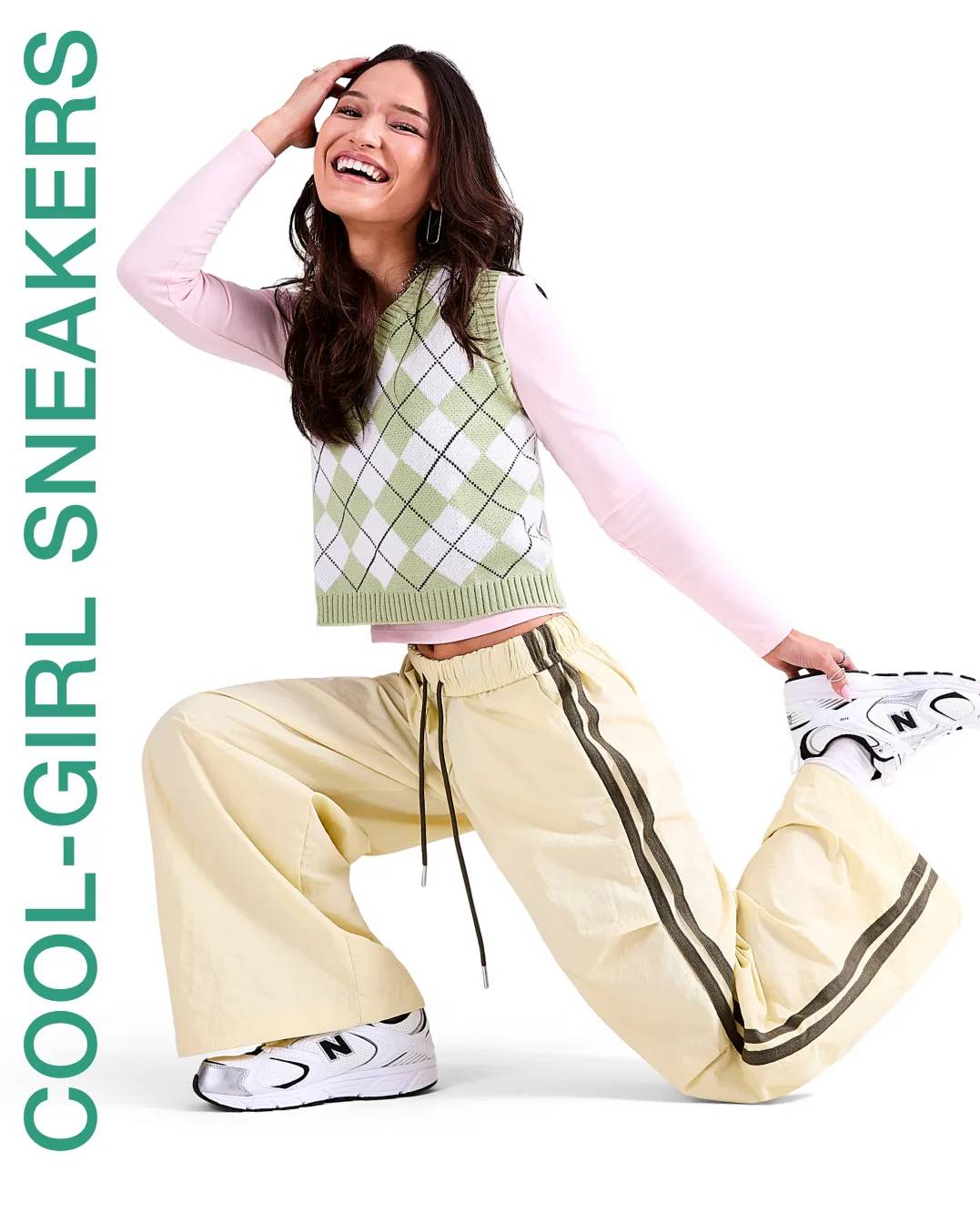 Woman wearing white New Balance sneakers