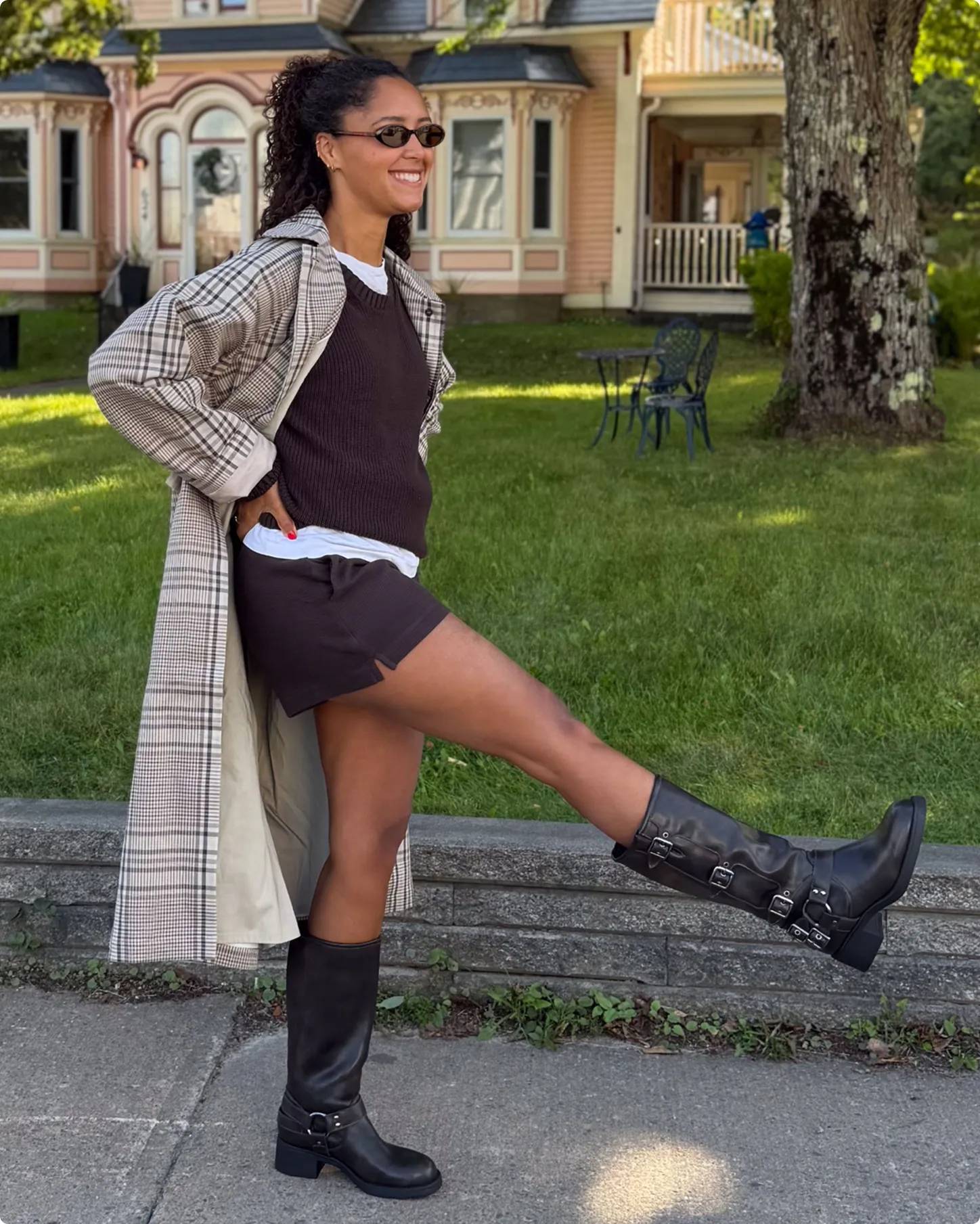 Influencer Filipa Jackson wearing black knee high boots