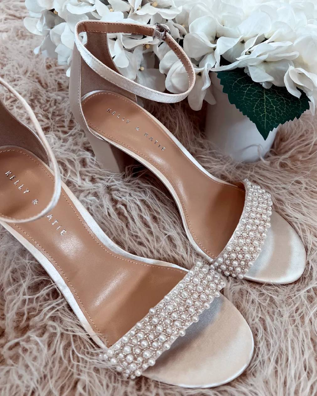Featuring pearl-embellished bridal shoes