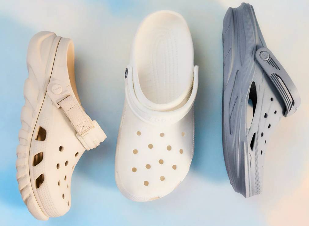 Various men's sandals on a blue background