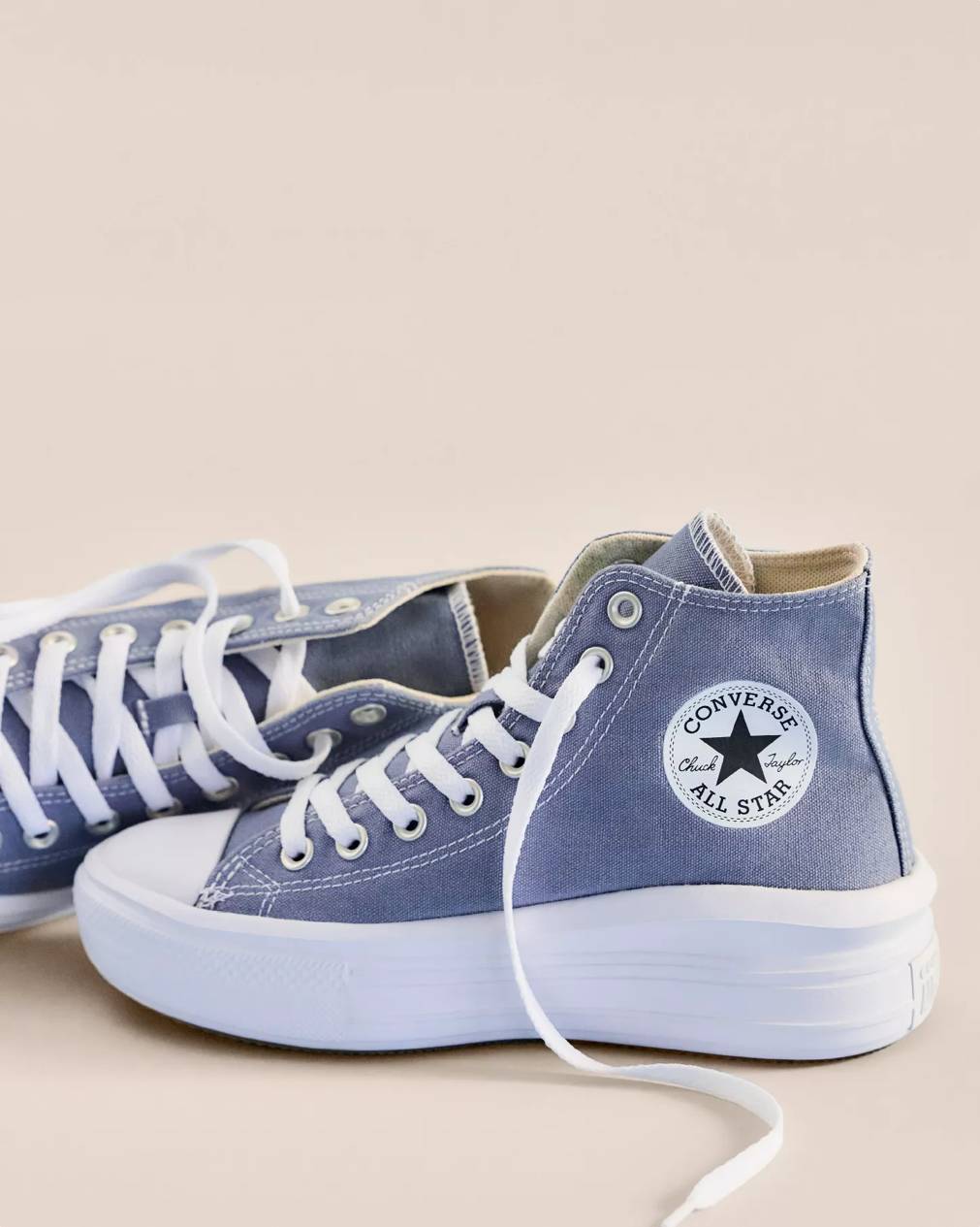 A pair of blue Converse sneakers