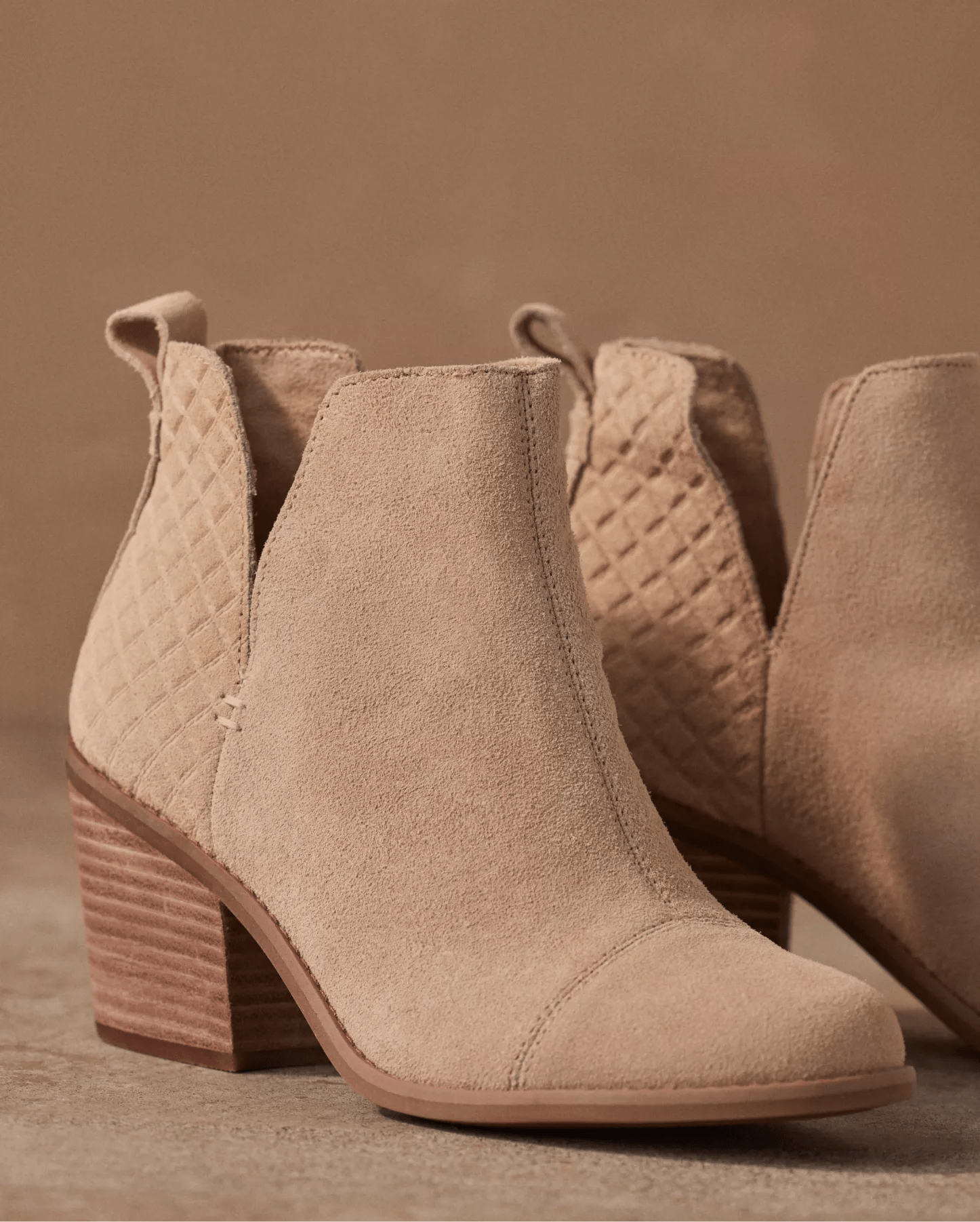 A pair of women's brown ankle booties