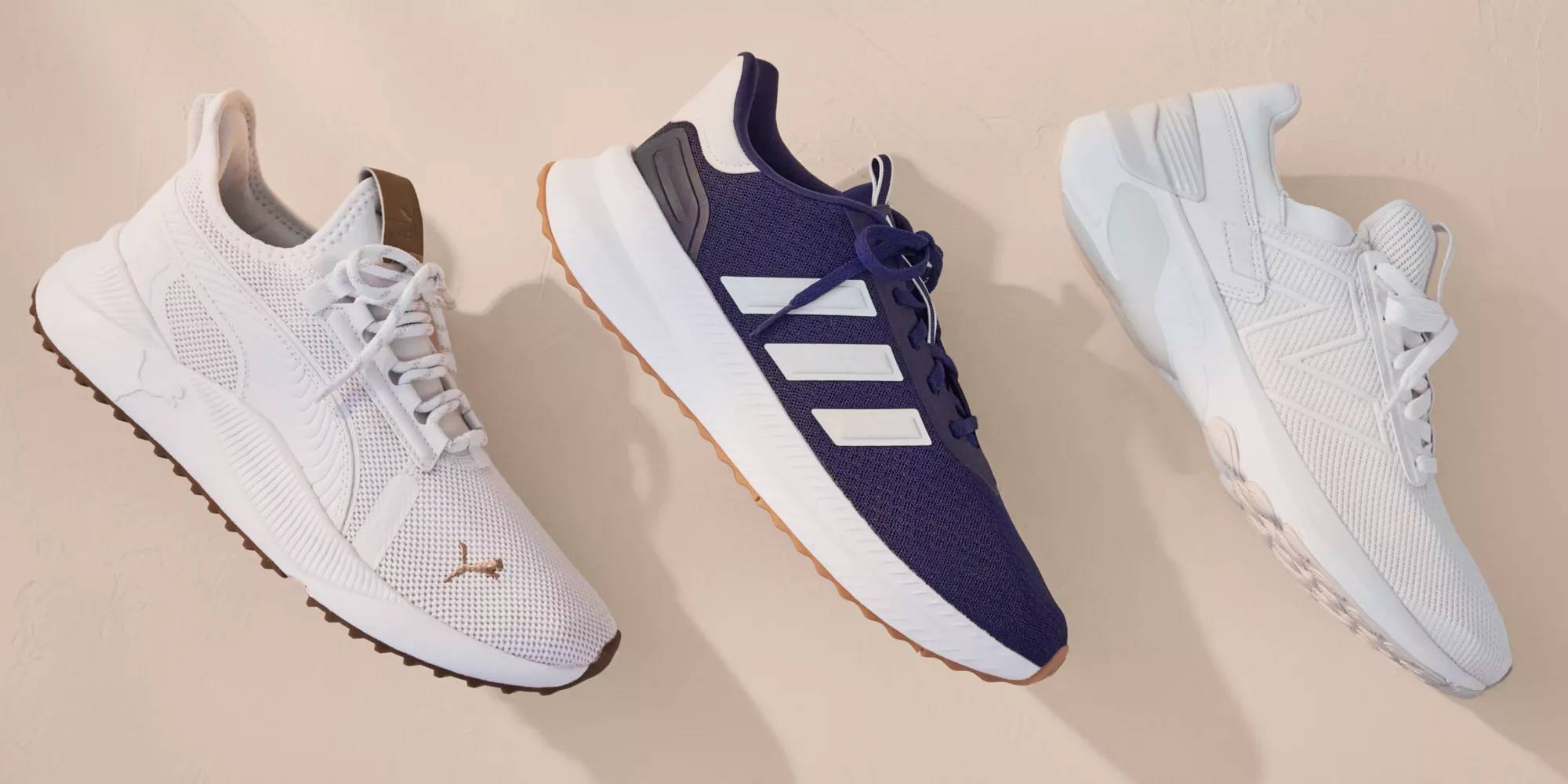 Three sneakers on a beige background