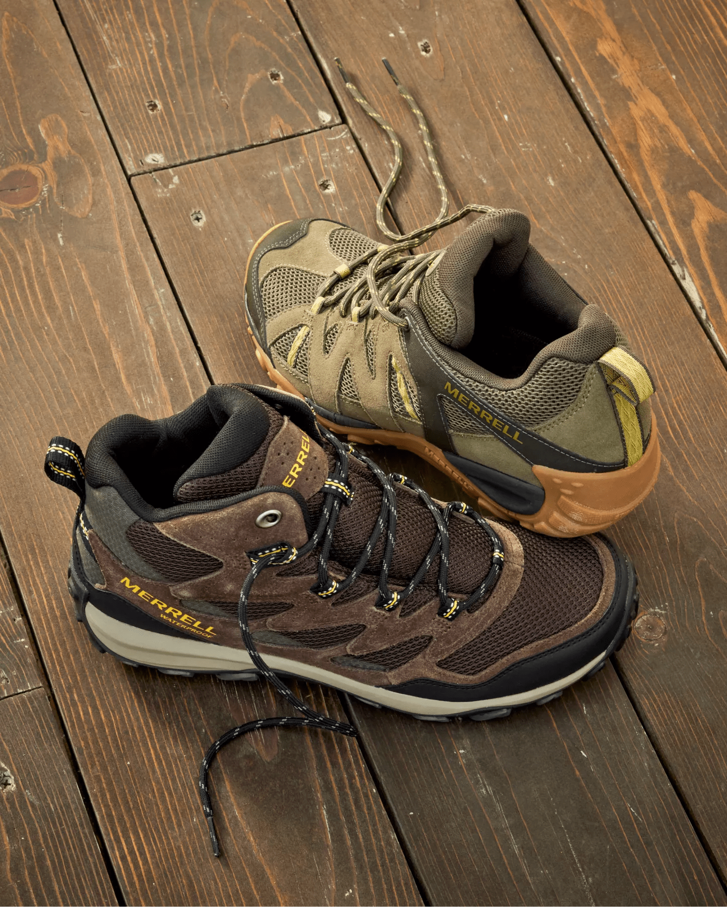 Two hiking boots on outdoor terrain